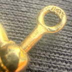Mini bow shackle in 14k gold