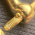Mini bow shackle in 14k gold