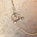 Mini bow shackle in 14k gold