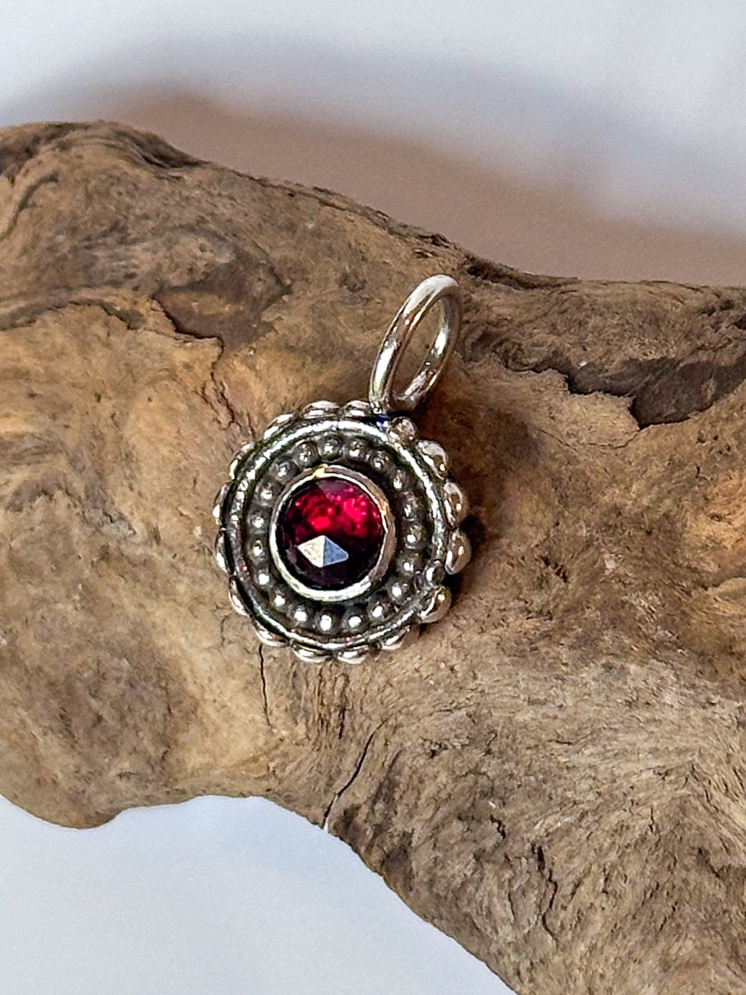 Garnet kaleidoscope Charm